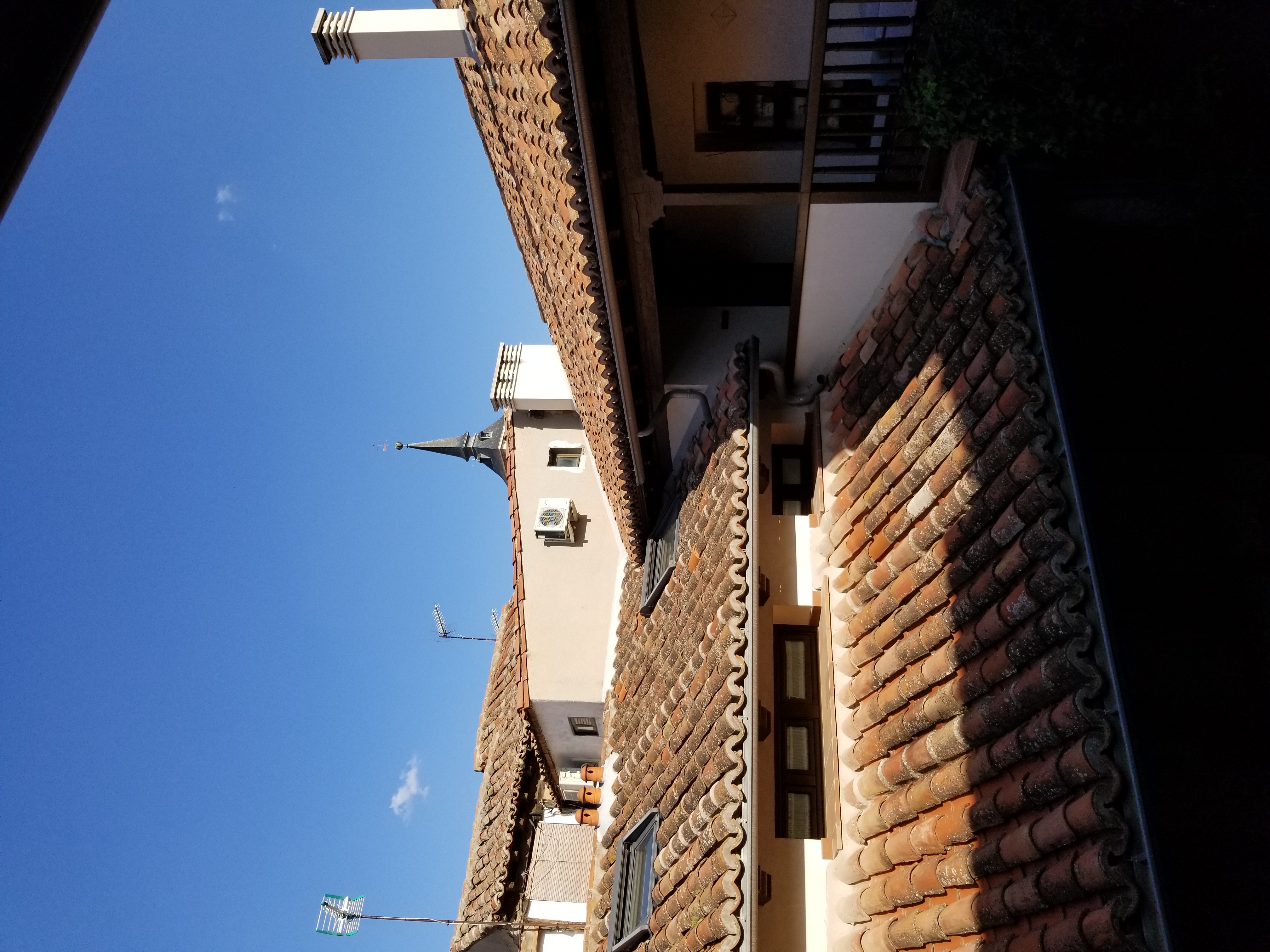 The tiled roof of a spanish inn